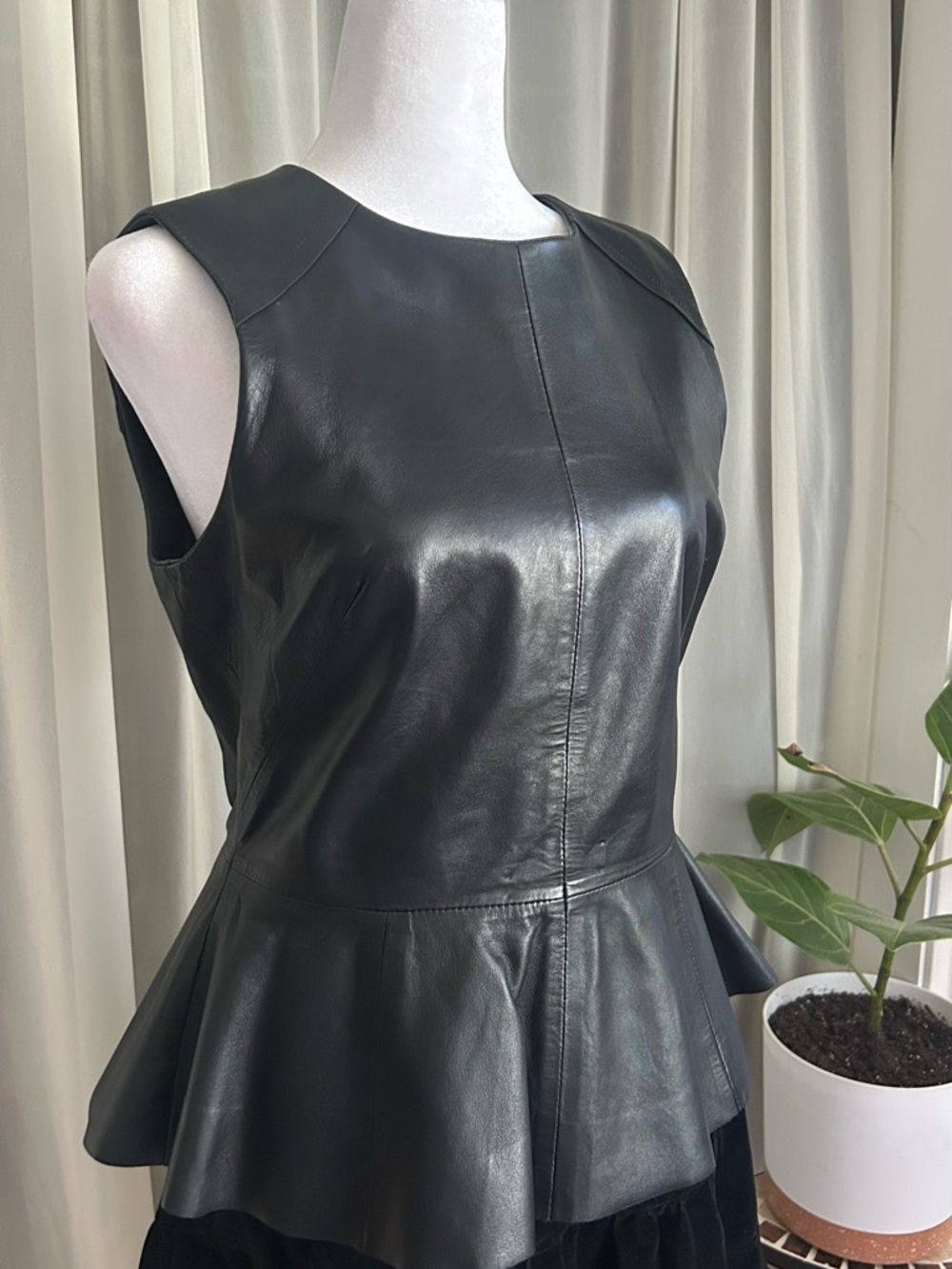 Sleeveless Black Leather Peplum shirt